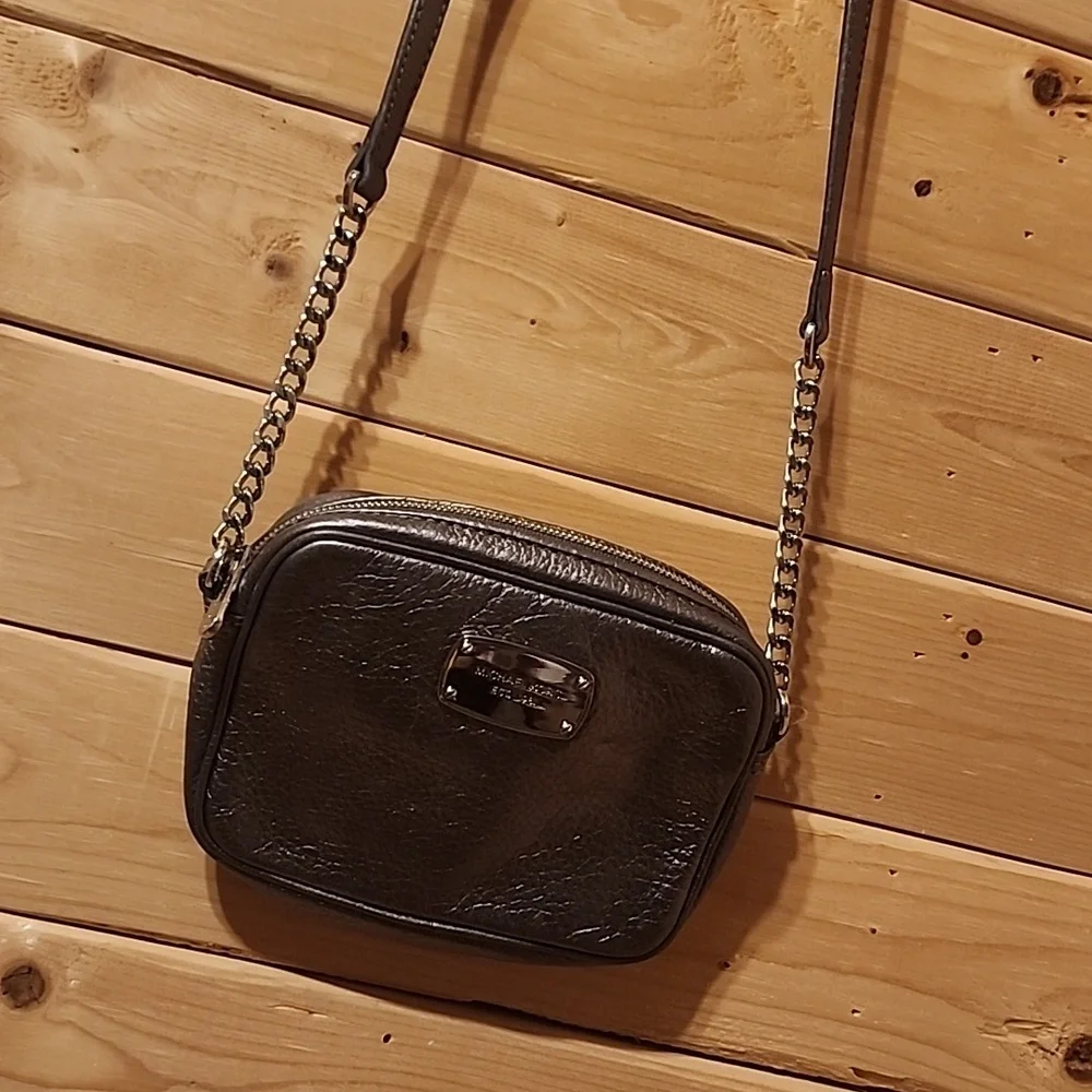 Woman’s Michael Kors crossbody bag bag,size Mini Silver